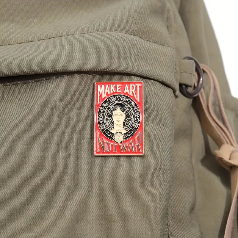 Make Art Not War Pin Badge