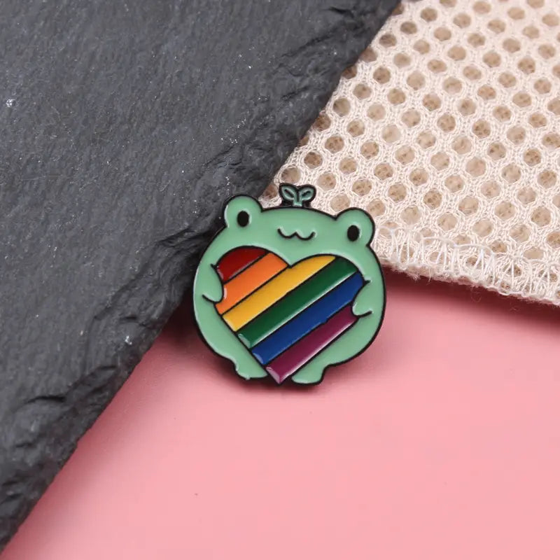 Cheery Frog Holding Rainbow Heart Pin Badge