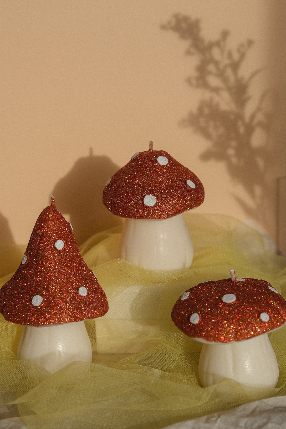 Glittery pastel mushroom shaped candles handmade in soy wax