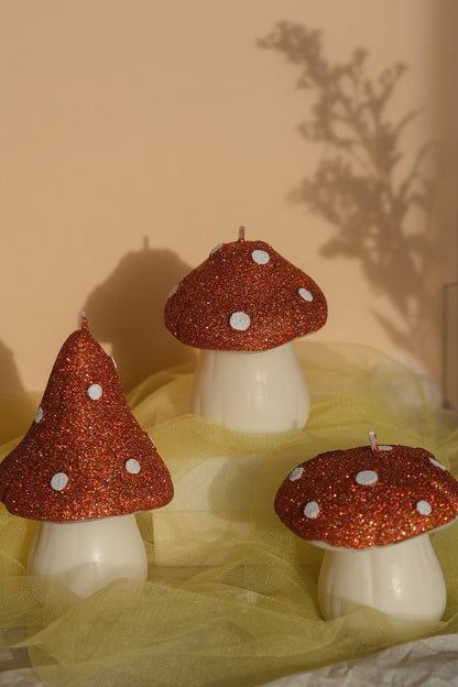Glittery pastel mushroom shaped candles handmade in soy wax