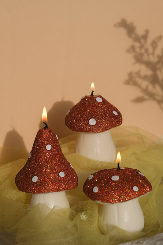 Glittery pastel mushroom shaped candles handmade in soy wax