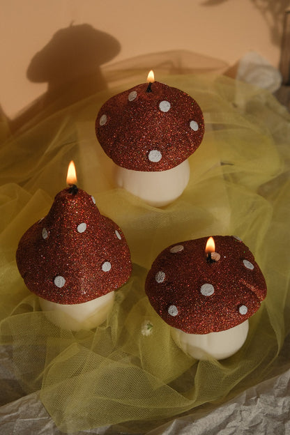 Glittery pastel mushroom shaped candles handmade in soy wax