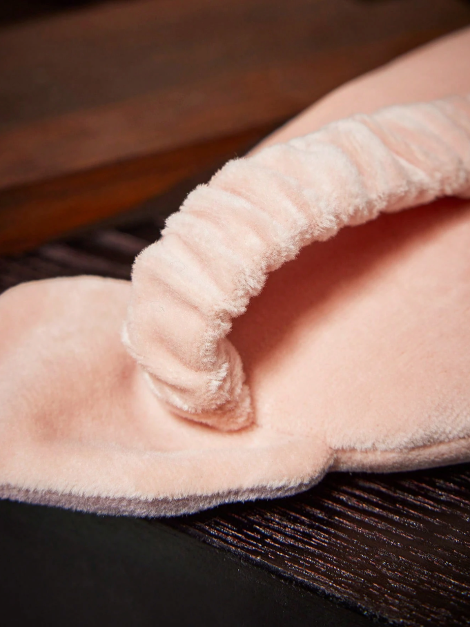 A soft bedtime eye mask featuring the printed face and ears of Dobby the Elf from Harry Potter.