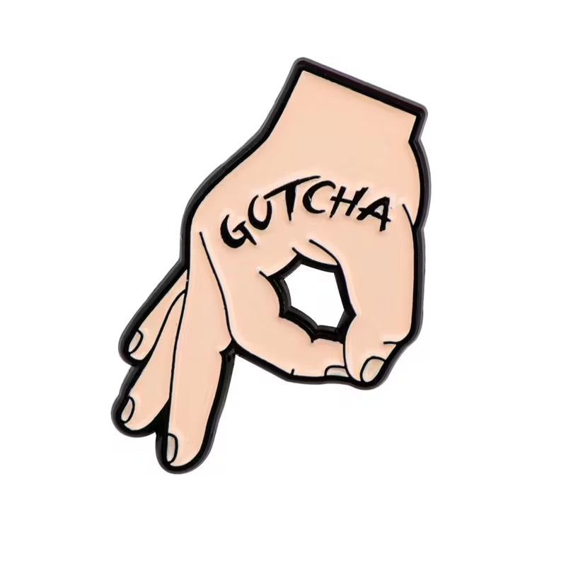 Gotcha hand pin badge
