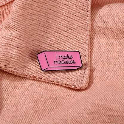 I Make Mistakes Pink Rubber Small Pin Badge